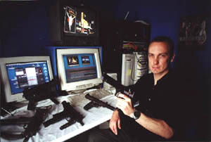 Director Mark Bakaitis studying a few weapons before making a choice to suit his characters